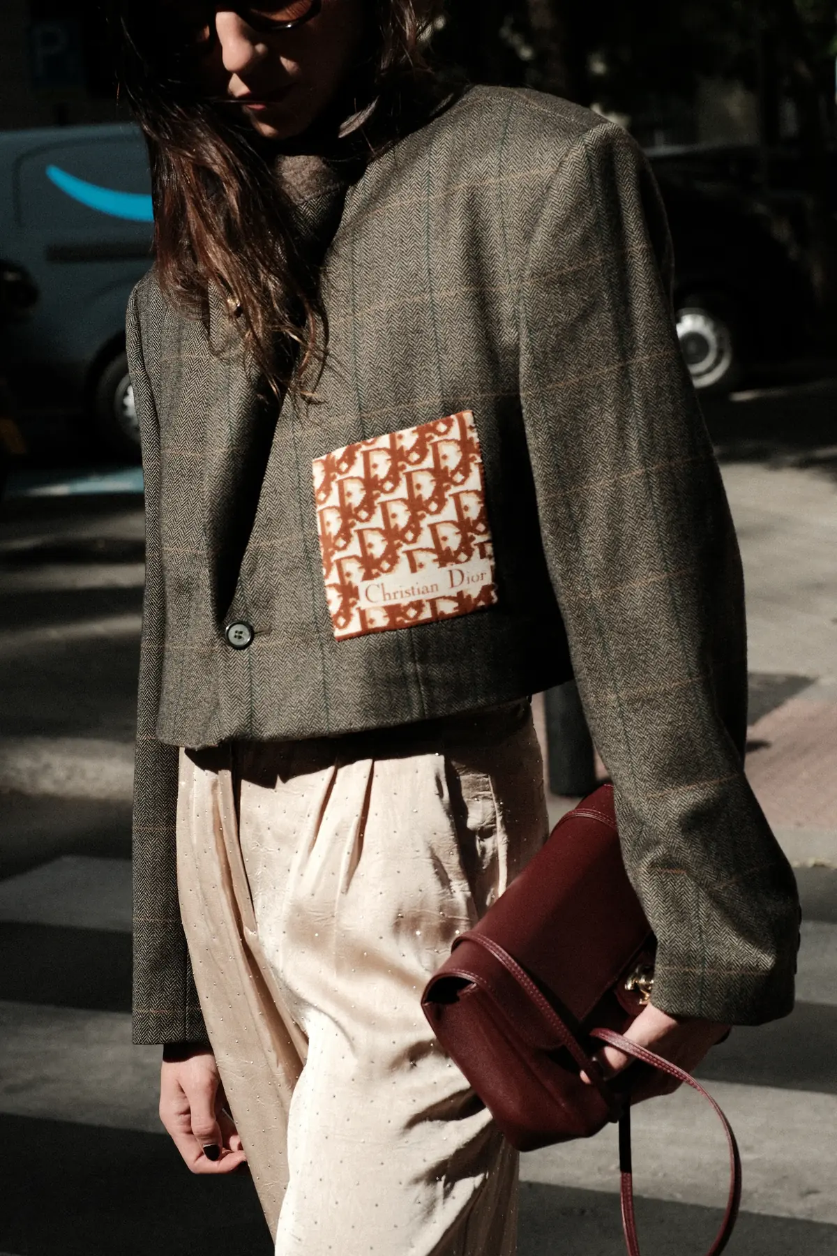Parché Studio check blazer with a monogram patch, worn on a Madrid street